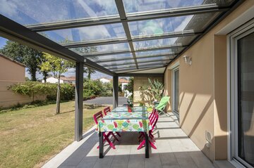 Pergola évolutive à toit fixe